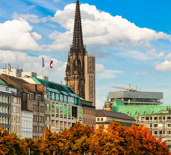 St. Nikolai Church spire and Alster Lake in Hamburg, Germany.