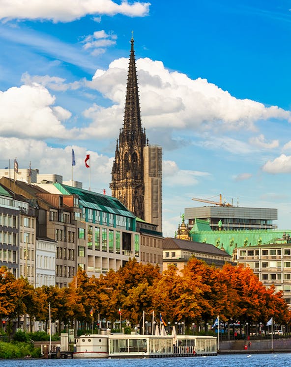 St. Nikolai Church spire and Alster Lake in Hamburg, Germany.