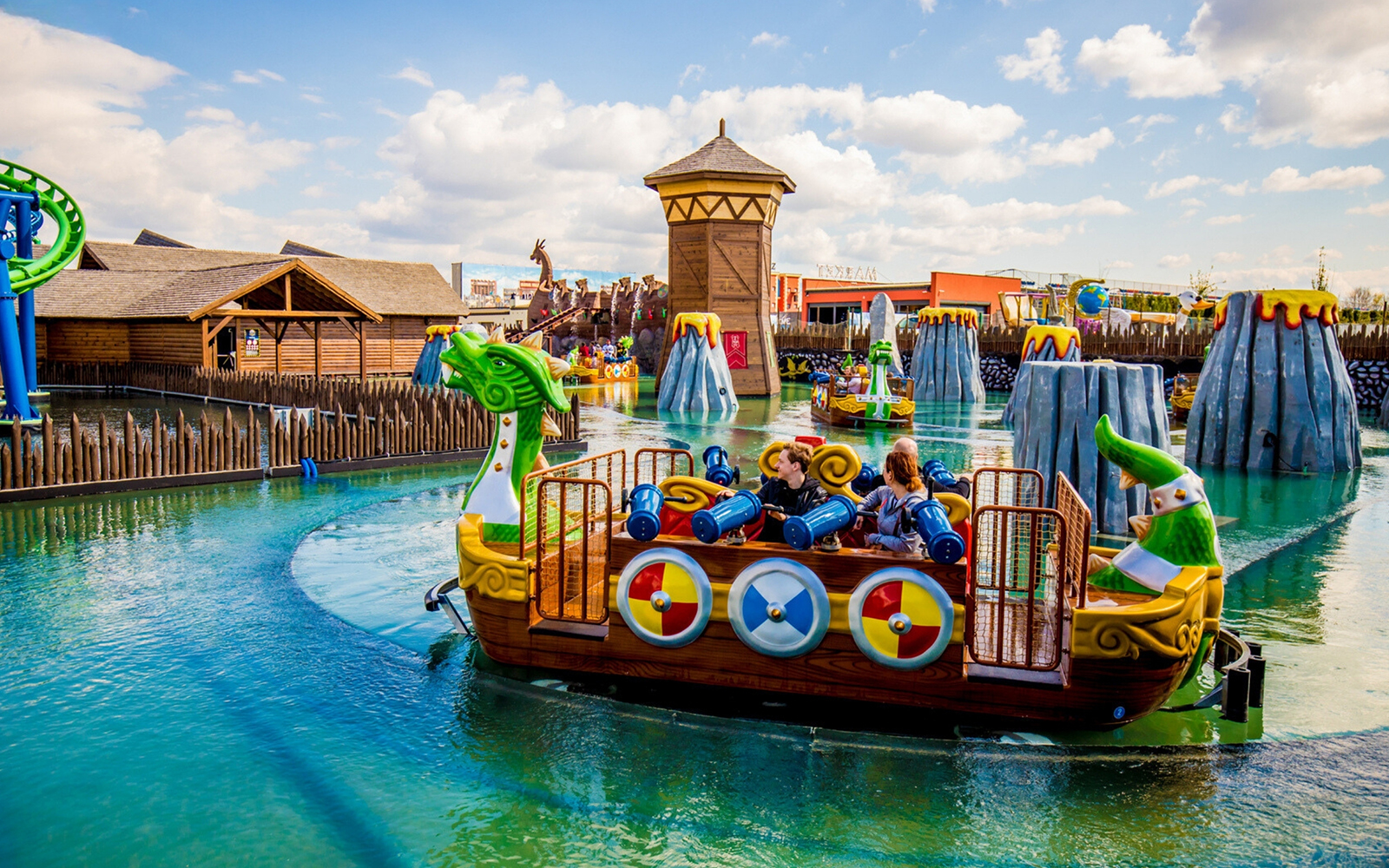 Children enjoying the Viking ride at Energylandia amusement park.