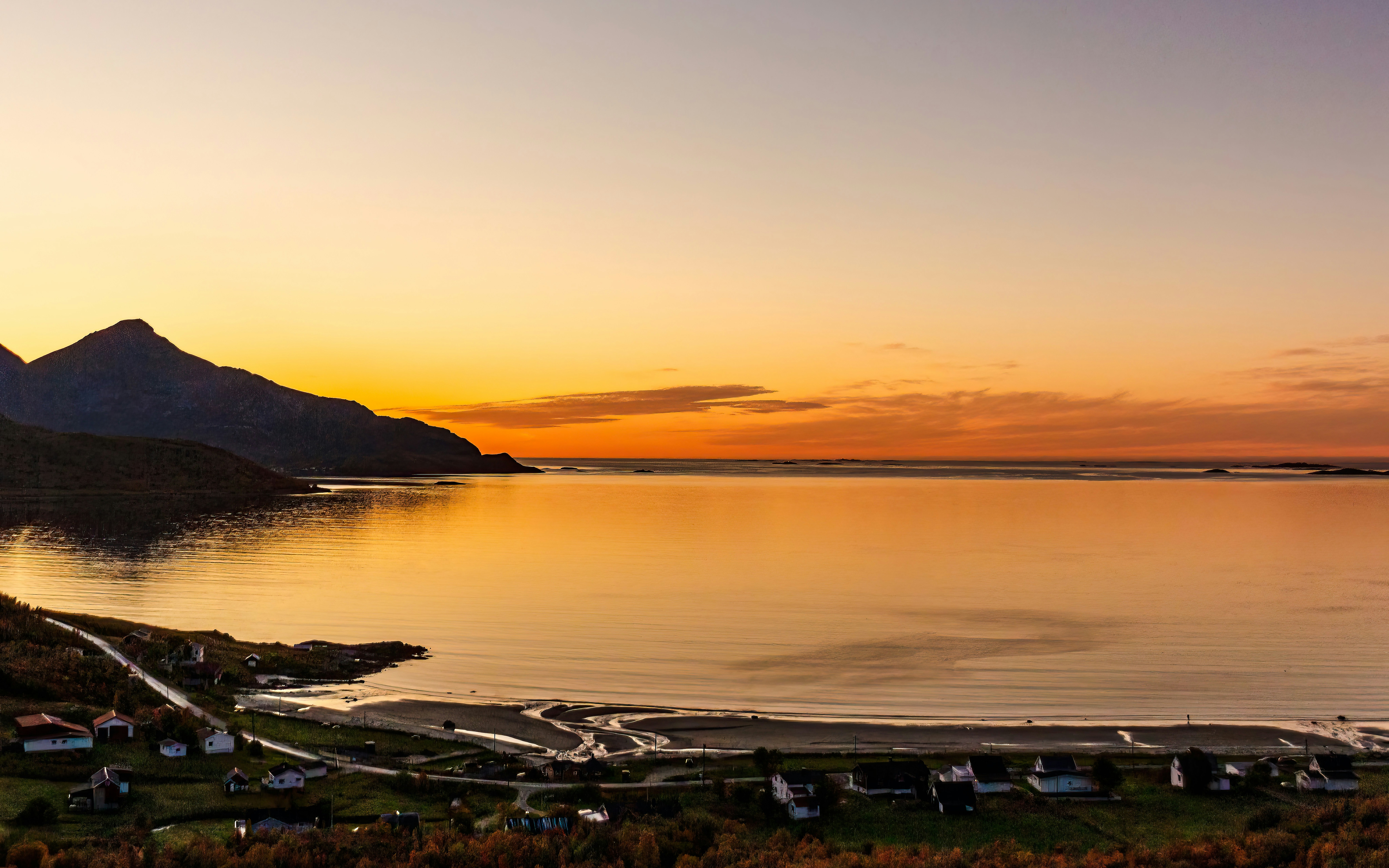 September sunset over Grøtfjord beach and mountains, Norway.
