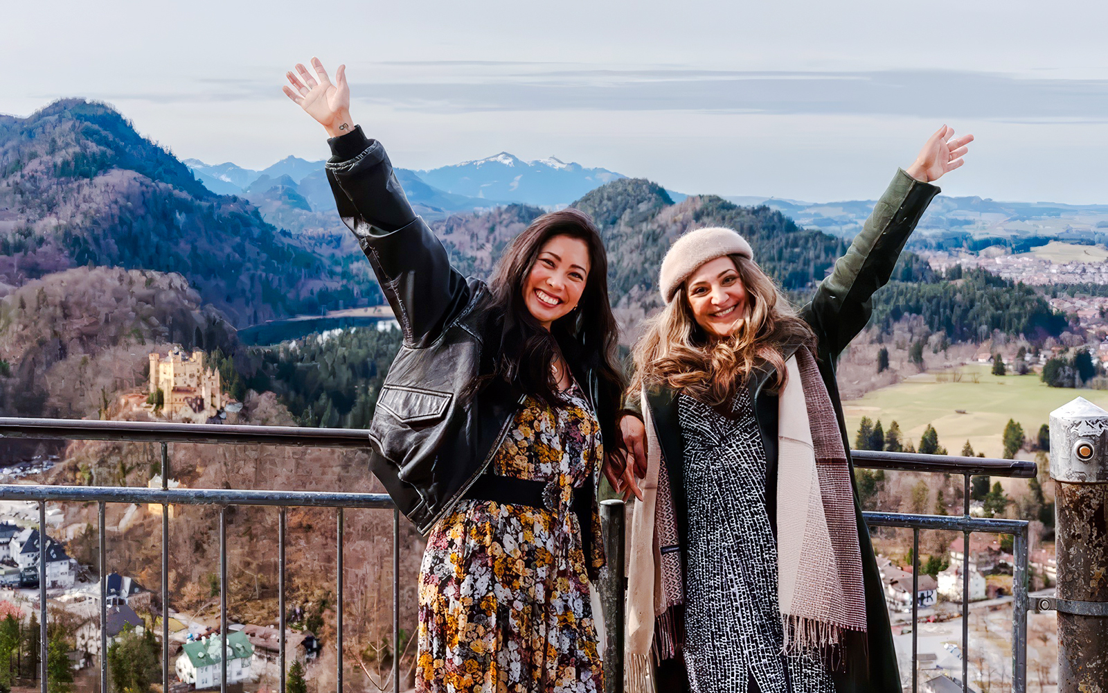 Tourists enjoying the view of Hohenschwangau Castle in Bavaria, Germany.
