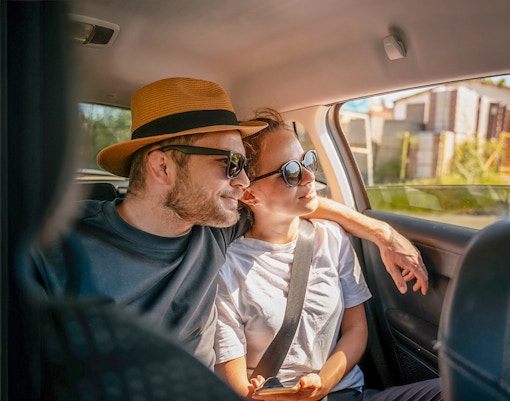 Tourists in a car enjoying a scenic drive of Dubrovnik
