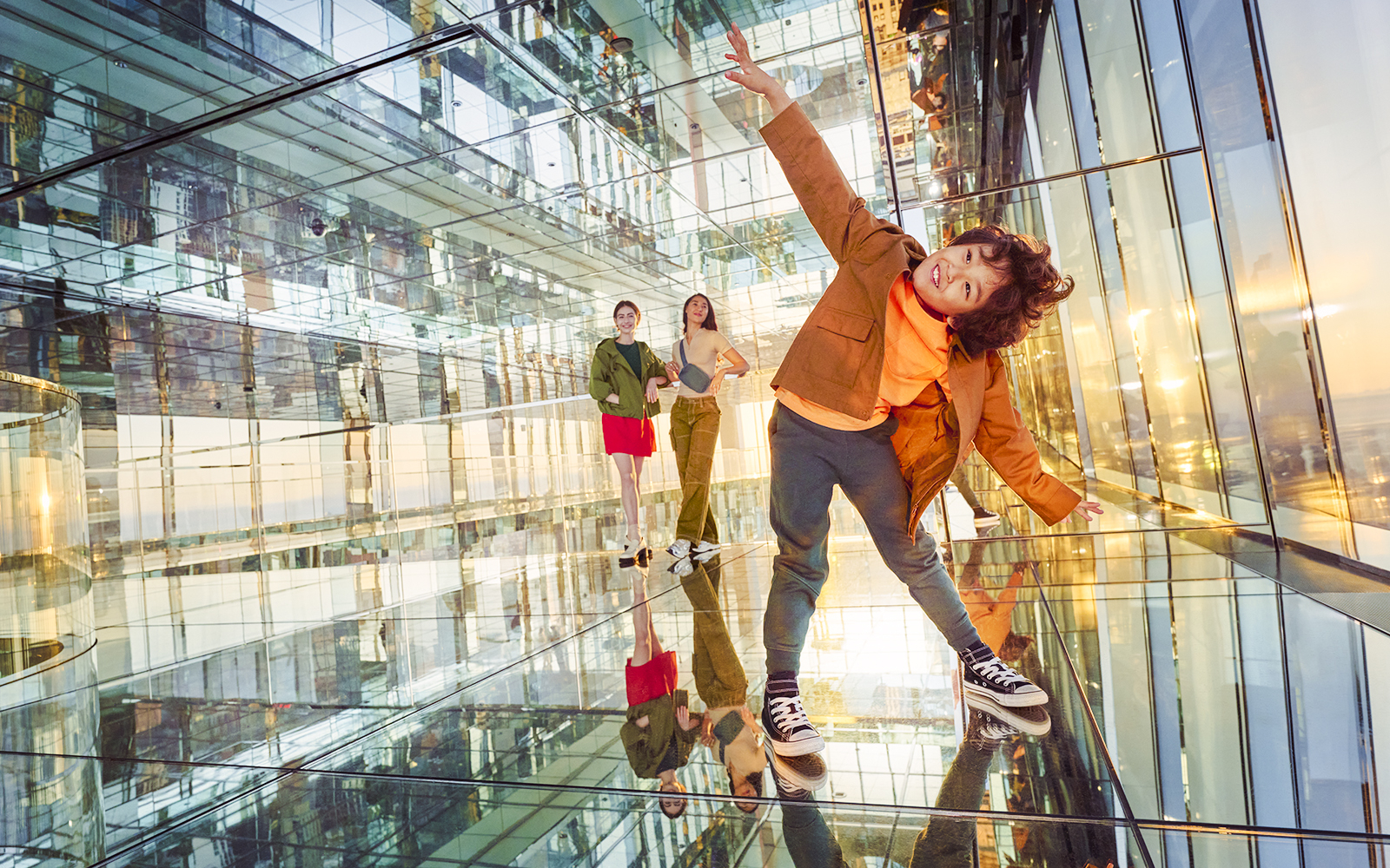 A child posing, enjoying the thrill of the heights at AIR