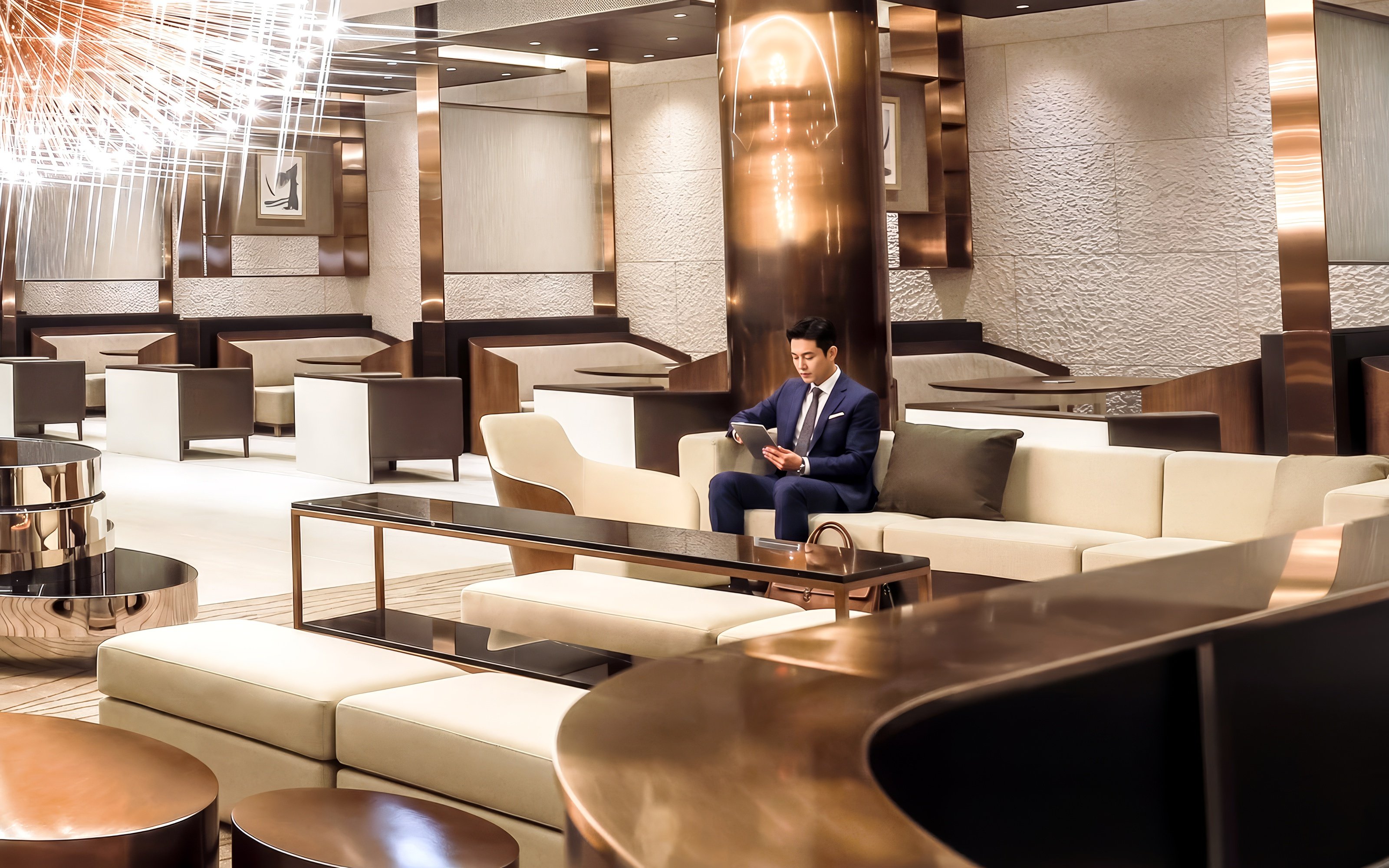 Man seated in Matina Gold lounge, Terminal 2, Incheon International Airport.