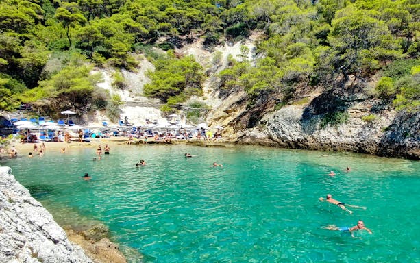 Swimmers enjoying clear waters near Vieste on the ferry route to Tremiti Islands.