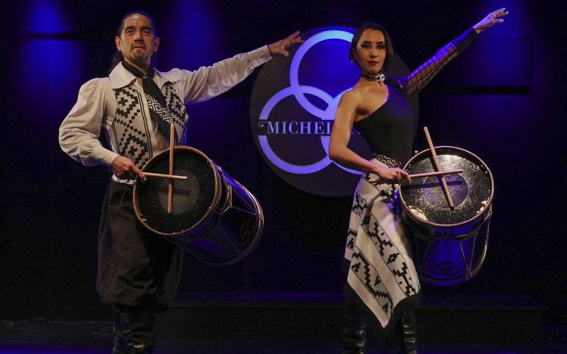Dancers with drums performing at Michelangelo Tango Show in Buenos Aires.