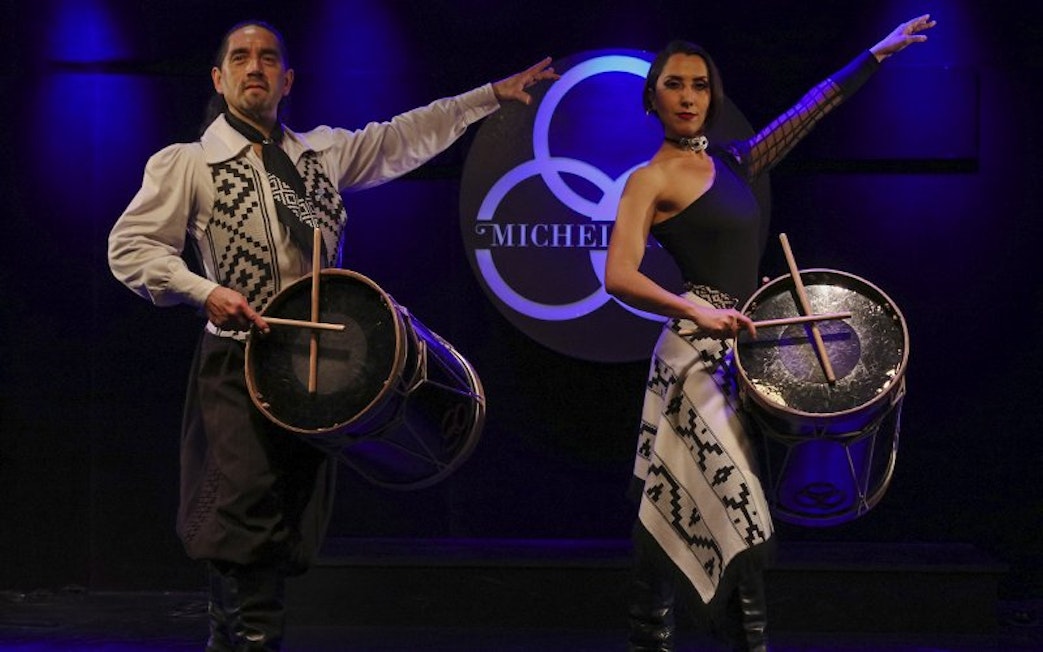 Dancers with drums performing at Michelangelo Tango Show in Buenos Aires.