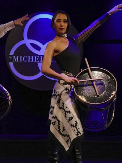 Dancers with drums performing at Michelangelo Tango Show in Buenos Aires.