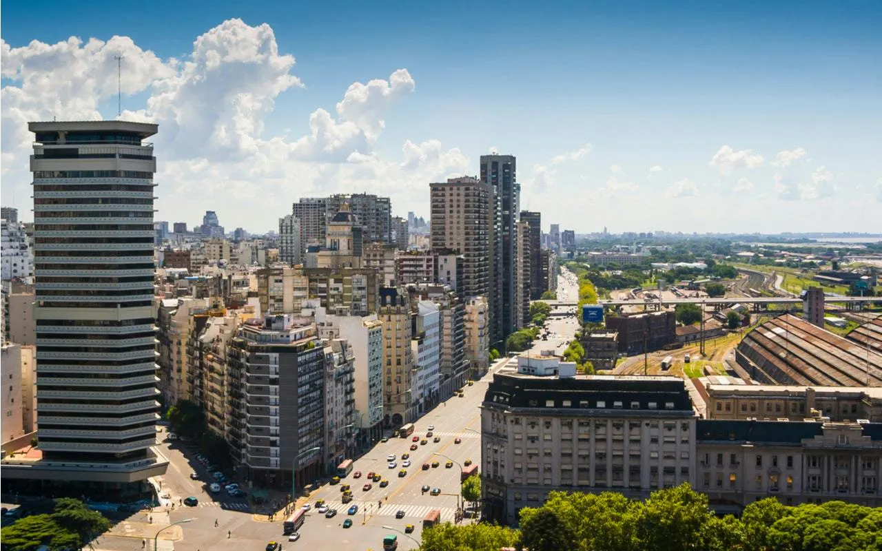 Buenos Aires cityscape with Avenida de Mayo, featuring historic architecture and urban skyline.