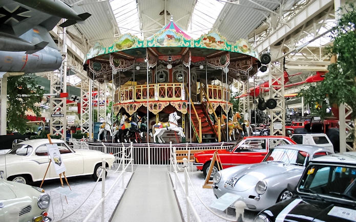 Carousel and vintage cars at Technik Museum Speyer, Germany.