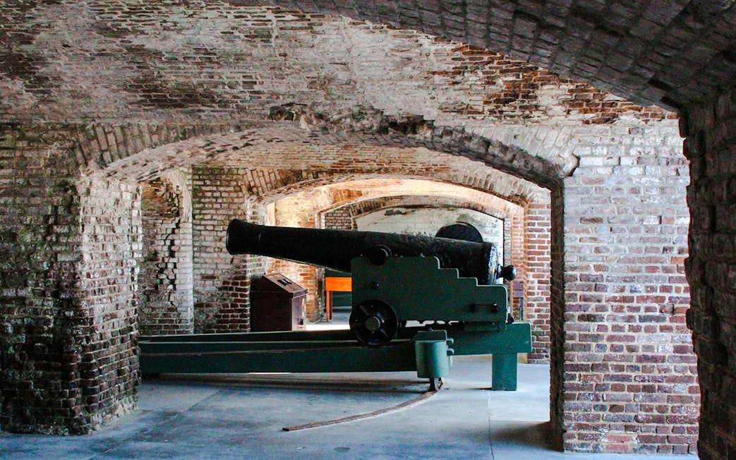 Cannon inside Fort Sumter National Monument brick archway.