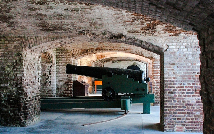 Cannon inside Fort Sumter National Monument brick archway.