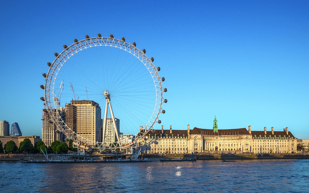 London Eye and surrounding buildings along the River Thames.