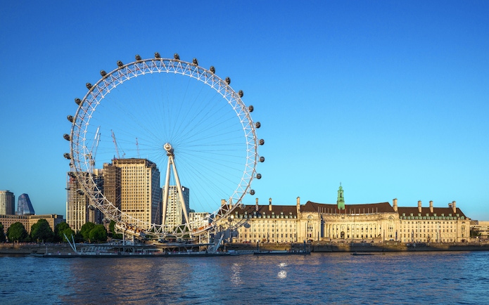 London Eye and surrounding buildings along the River Thames.