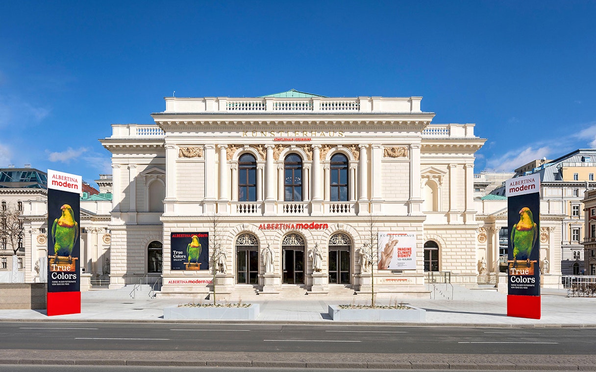 ALBERTINA MODERN museum entrance in Vienna with colorful art banners.