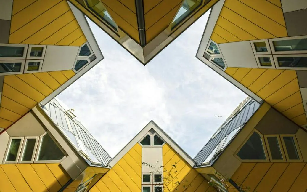 Cube houses in Rotterdam viewed from below during the self-guided city exploration game.