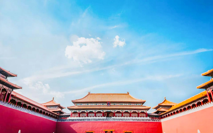 Meridian Gate, main entrance to the Forbidden City, Beijing, China, under a clear blue sky.