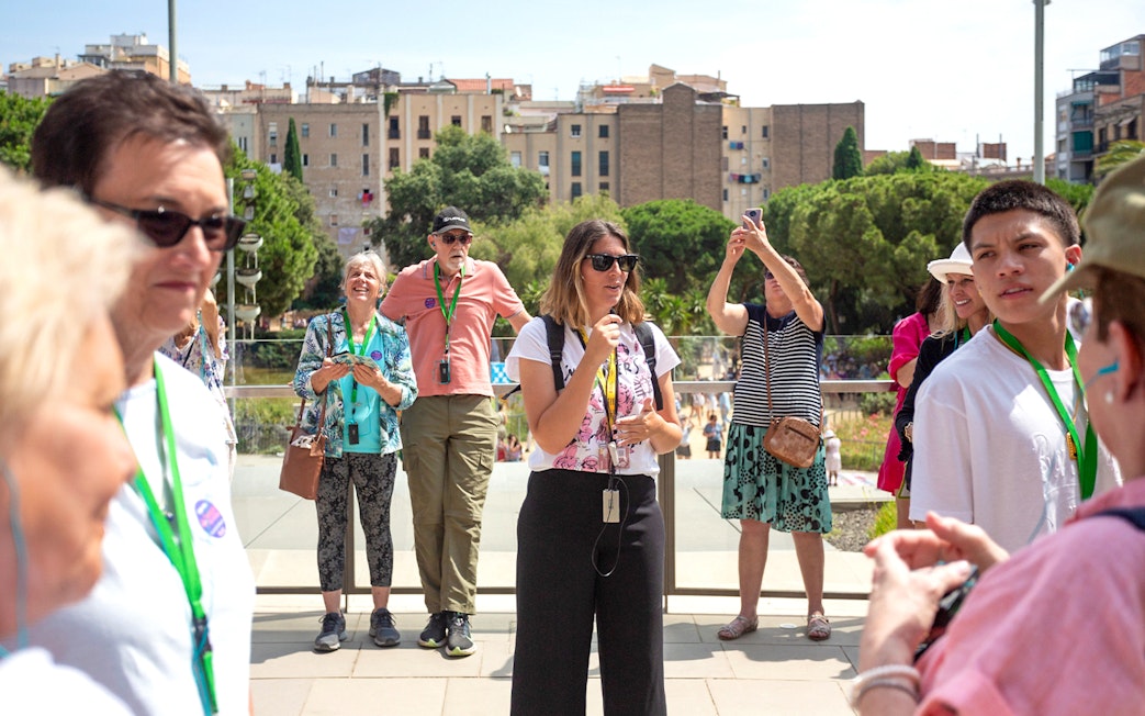 Tour guide leading a group at Sagrada Familia, Barcelona.