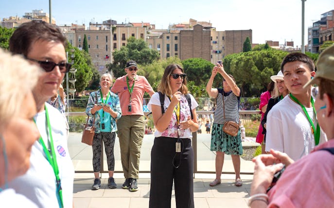 Tour guide leading a group at Sagrada Familia, Barcelona.