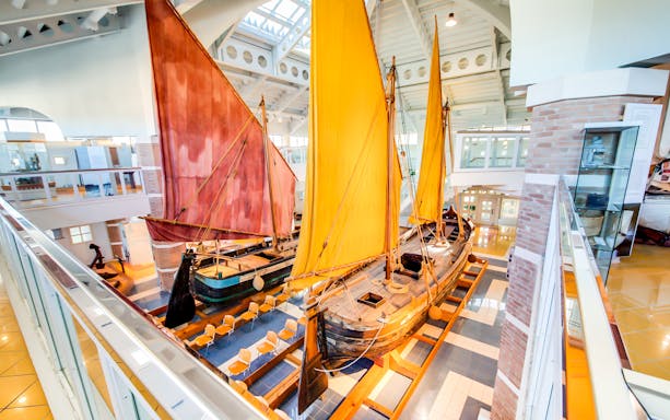 Sailboats displayed inside Cesenatico Maritime Museum, Italy.