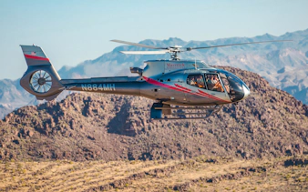 Helicopter flying over the Grand Canyon during Skywalk tour.
