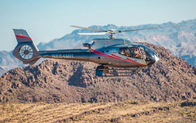 Helicopter flying over the Grand Canyon during Skywalk tour.