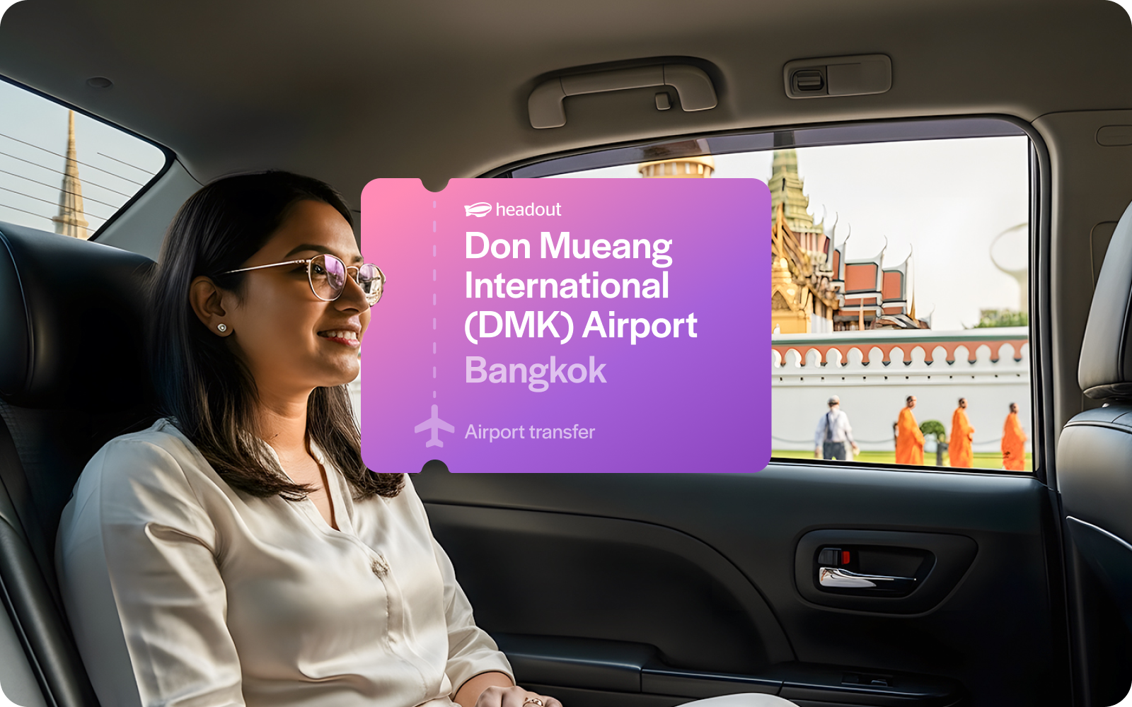 Private car transfer from Don Mueang Airport, Bangkok, with view of local temple.