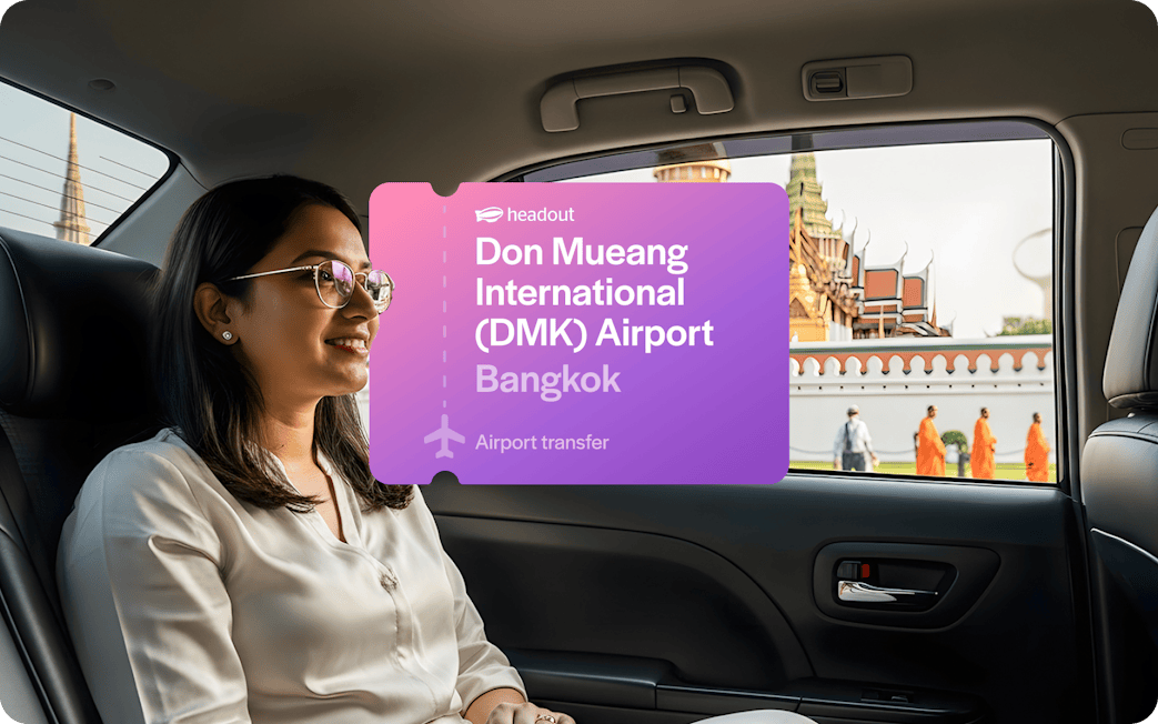 Private car transfer from Don Mueang Airport, Bangkok, with view of local temple.
