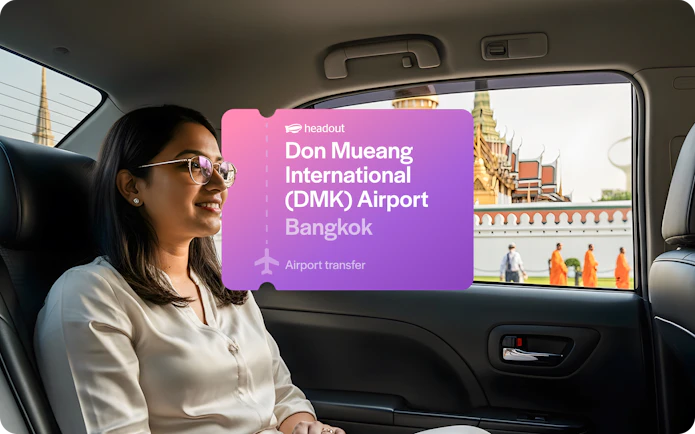 Private car transfer from Don Mueang Airport, Bangkok, with view of local temple.