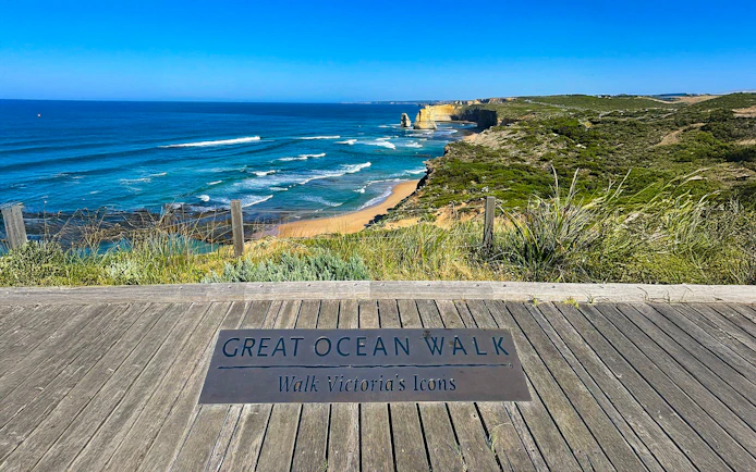 Great Ocean Walk sign overlooking coastline on Great Ocean Road, Victoria.