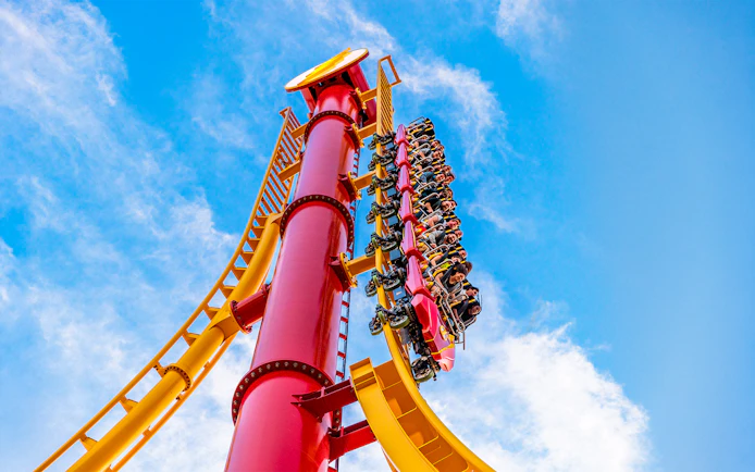 Roller coaster riders on THE FLASH™ Vertical Velocity at Six Flags Great Adventure.
