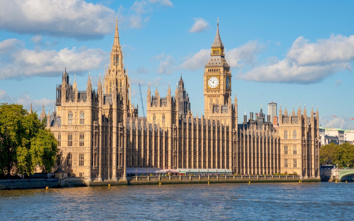 Houses of Parliament and Big Ben by the River Thames in London.