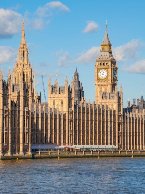 Houses of Parliament and Big Ben by the River Thames in London.