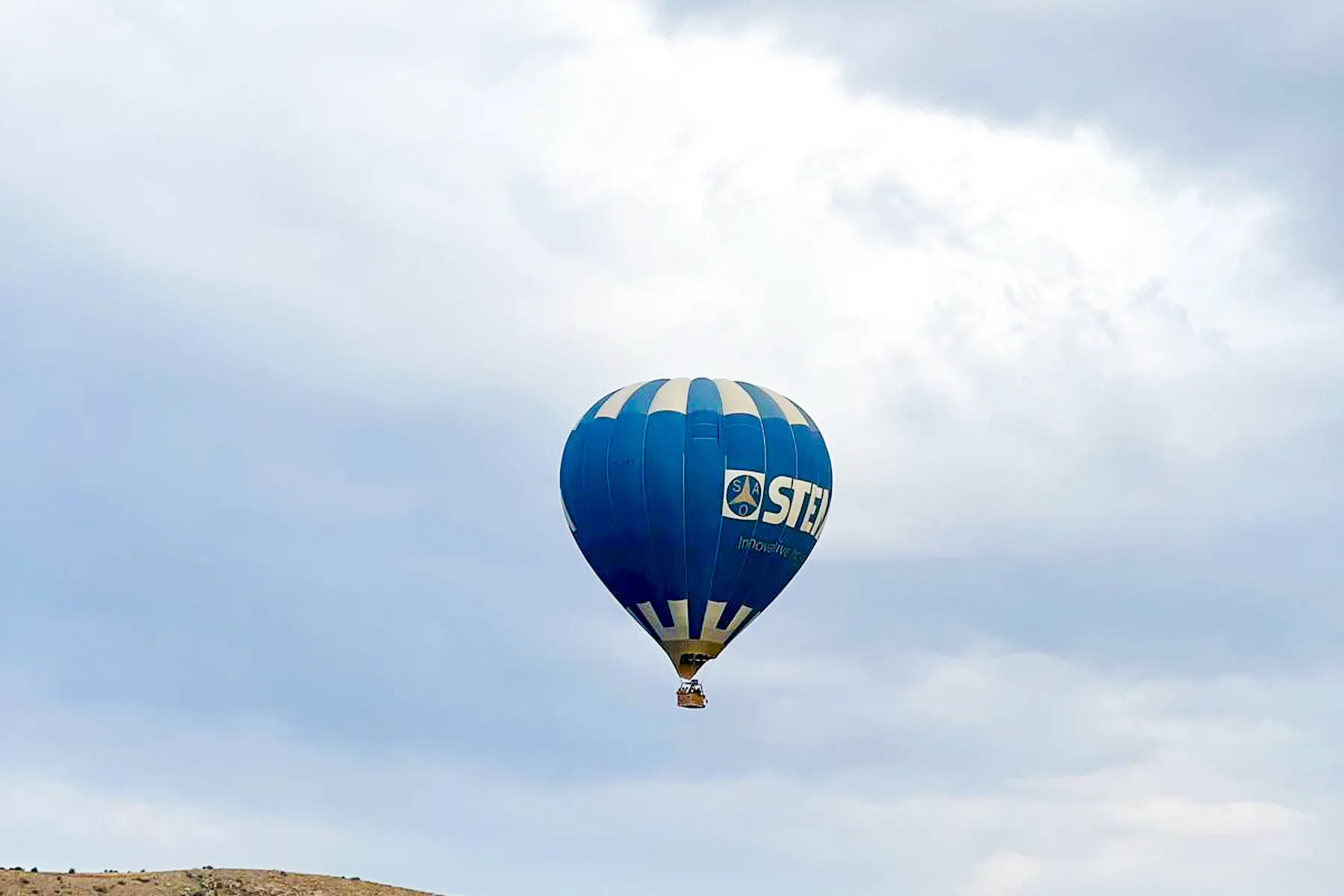 Hot air balloon flying over Ihlara Valley, Cappadocia.