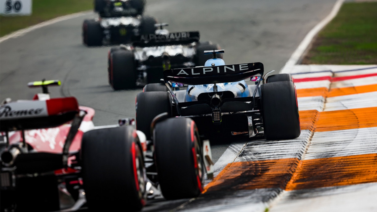 Race cars on track at Formula 1 Monza Grand Prix, Italy.