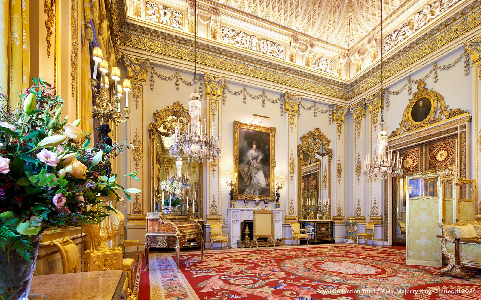 Buckingham Palace State Rooms with ornate chandeliers and gilded decor.