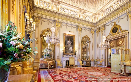 Buckingham Palace State Rooms with ornate chandeliers and gilded decor.
