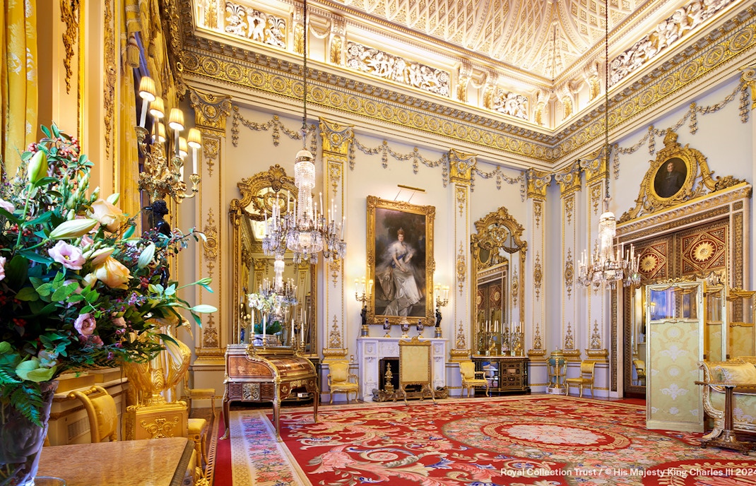 Buckingham Palace State Rooms with ornate chandeliers and gilded decor.