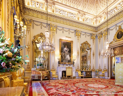 Buckingham Palace State Rooms with ornate chandeliers and gilded decor.