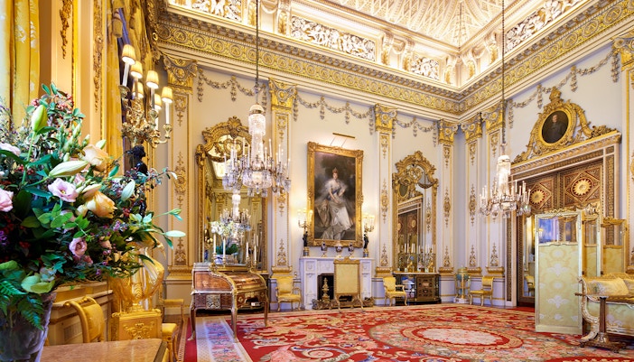 Buckingham Palace State Rooms with ornate chandeliers and gilded decor.