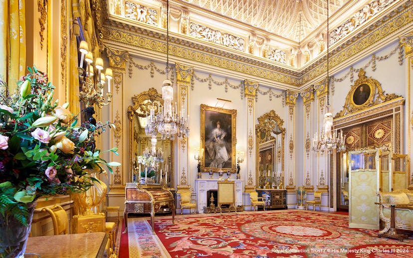 Buckingham Palace State Rooms with ornate chandeliers and gilded decor.