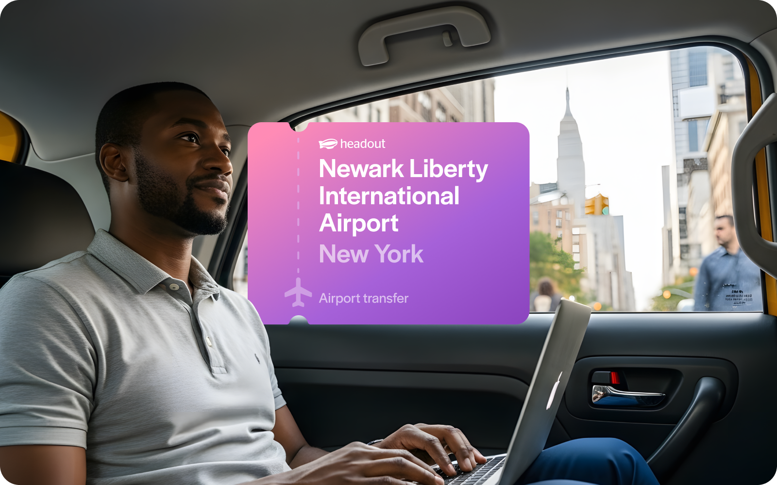 Man in car with laptop, view of New York City, promoting Newark Liberty International Airport transfer.