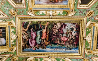 Ceiling fresco in Palazzo Vecchio depicting historical scene, part of Medici Power Story tour, Rome.