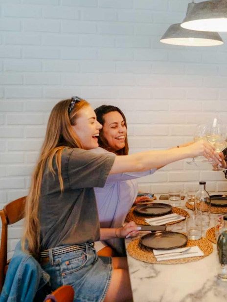 Group enjoying wine at a table during Lisbon Food Tour.