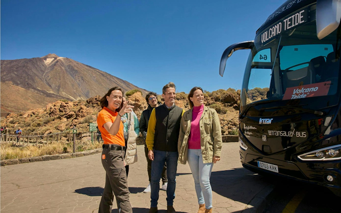 Guests enjoying Mount Teide tour with cable car ride and coach transfer.