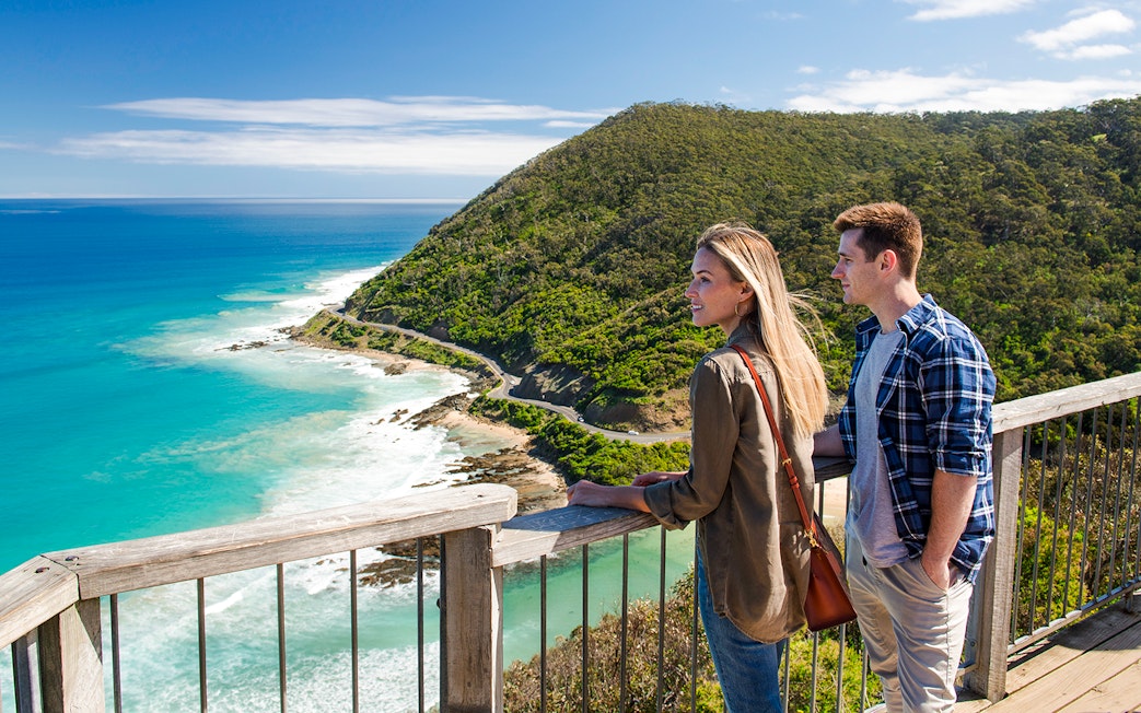 Couple enjoying the view from Teddy's Lookout on the Great Ocean Road.