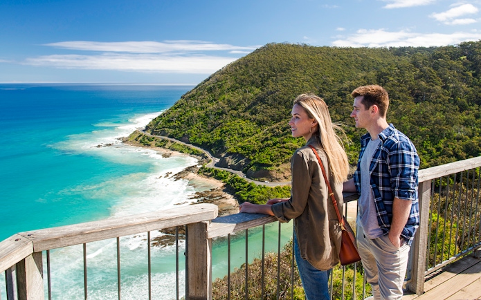 Couple enjoying the view from Teddy's Lookout on the Great Ocean Road.