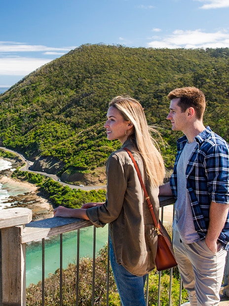 Couple enjoying the view from Teddy's Lookout on the Great Ocean Road.