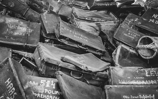 Suitcases from Auschwitz-Birkenau victims, part of Krakow tour from Warsaw by train.
