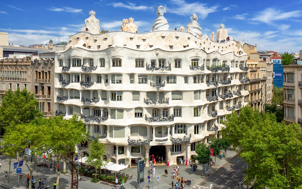 Facade of Casa Mila La Pedrera in Barcelona with unique architectural design.